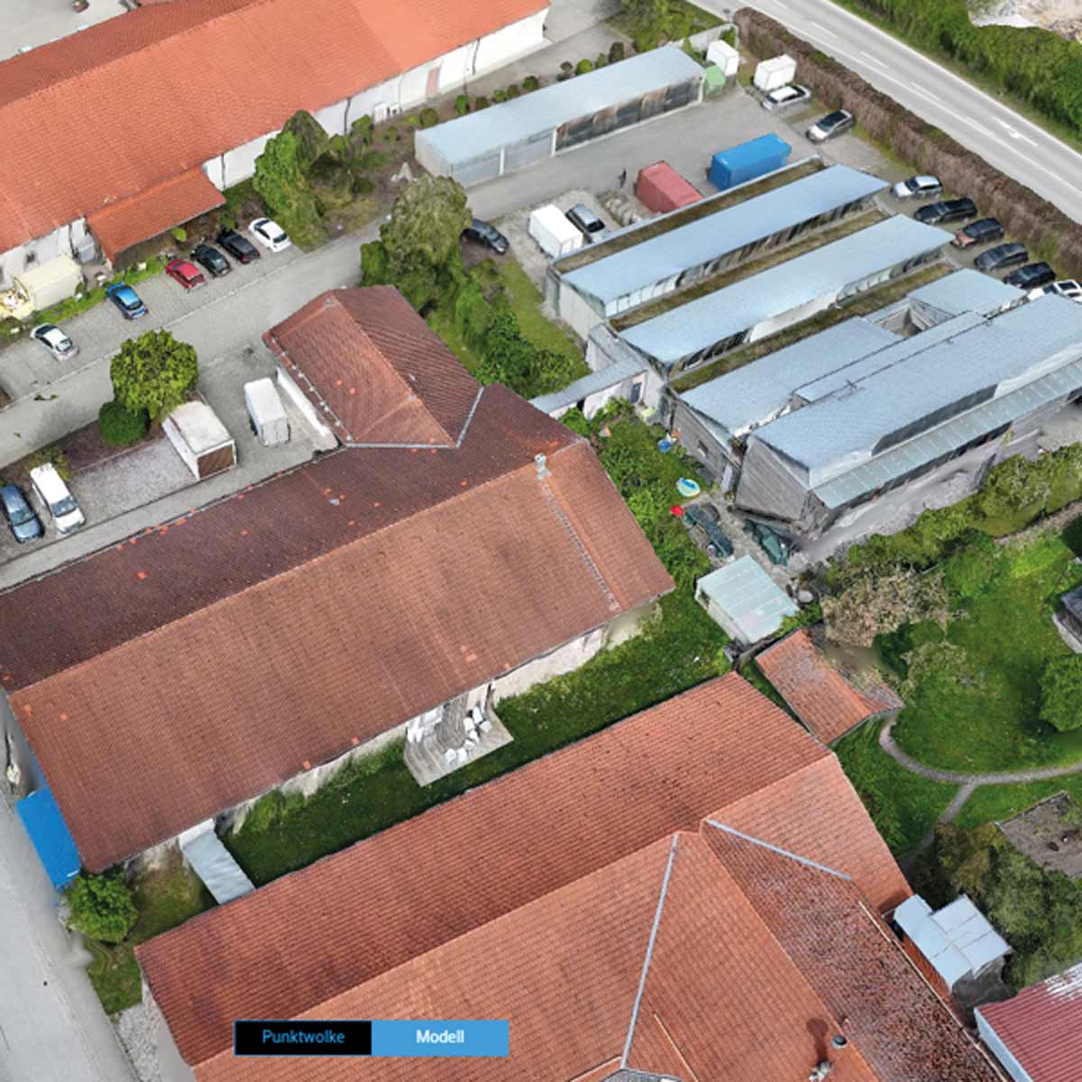 3D-Modell eines Gewerbegebiets mit roten Dächern aus Drohnenfotos in DJI Terra.